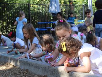 students blowing bubbles